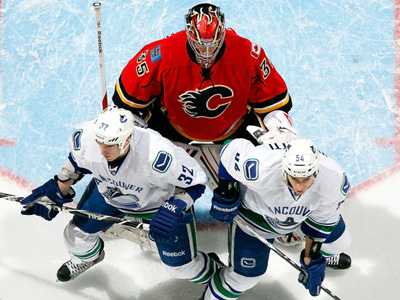 Canucks too hot to handle as they torch Flames