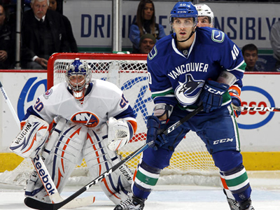 Canucks school Islanders with a 4-1 win