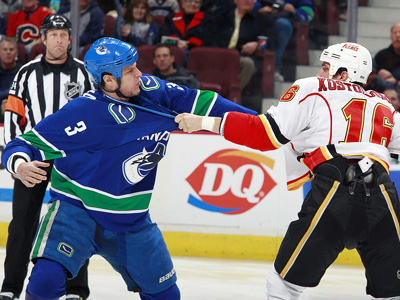 Canucks in giving mood, lose to Flames