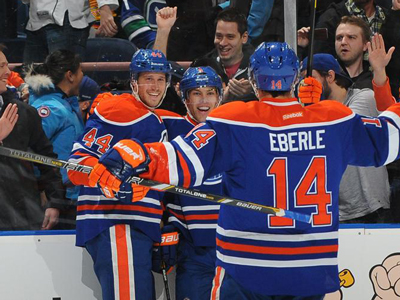 Hall carries Oilers to within one point of final playoff spot