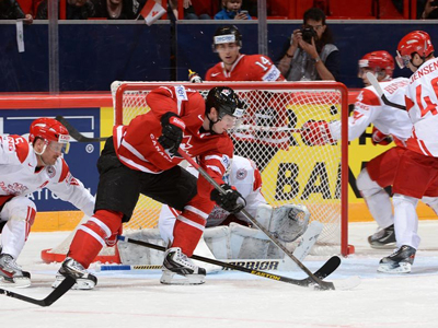 Duchene scores twice, leading Canada over Denmark in tournament opener