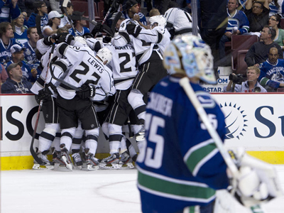 Kings kick Canucks to the curb with 2-1 OT win